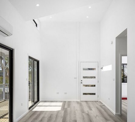 Granny-flat-sydney-living-room-design-dormer-windows-raked-ceiling-2sliding-doors-led-lighting