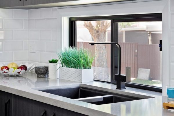 granny-flat-bluegum-sydney-kitchen-glass-window-splashback-appliances-subway-tiles-polytec-laminate-quantum-quartz-benchtop