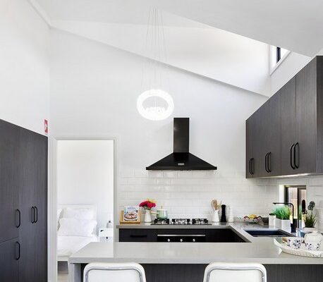 granny-flat-bluegum-sydney-raked-ceiling-dormers-skylight-kitchen-black-appliances-polytec-quantum-quartz-40mm-benchtop-waterfall