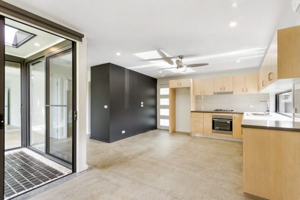 granny-flat-sydney-design-berowra-60m2-polished-concrete-living-kitchen-laminate-kitchen-40mm-benchtop-glass-splashback-top-quality-construction