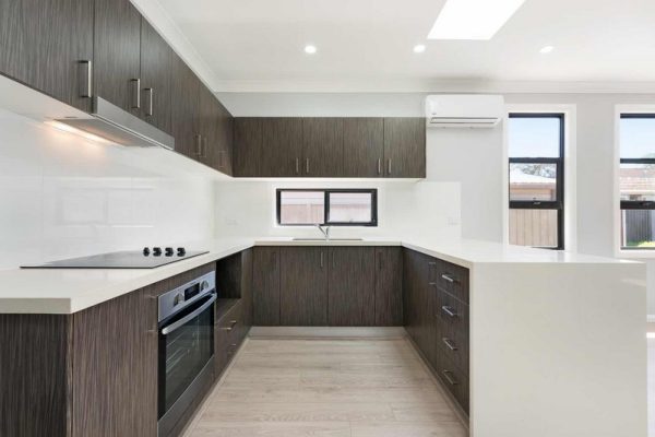 granny-flat-sydney-design-kitchen-polytec-kitchen-quantum-quartz-benchtop-skylight-black-windows