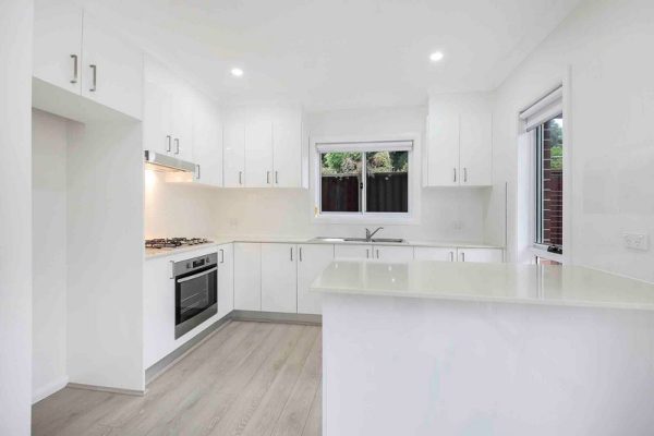 granny-flat-sydney-kitchen-design-bluegum-detail-laminate-floor-polyurethane-doors-quantum-quartz-westinghouse granny-flat-sydney-kitchen-design-bluegum-detail-laminate-floor-polyurethane-doors-quantum-quartz-westinghouse