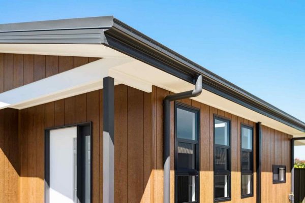 granny-flat-sydney-panania-bluegum-approval-corner-block-weathertex-timber-natural-vertical-cladding-black-windows